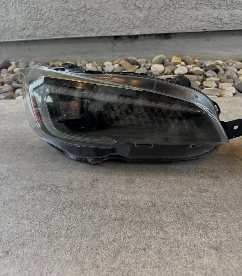 Custom headlight unit — bare shell before build